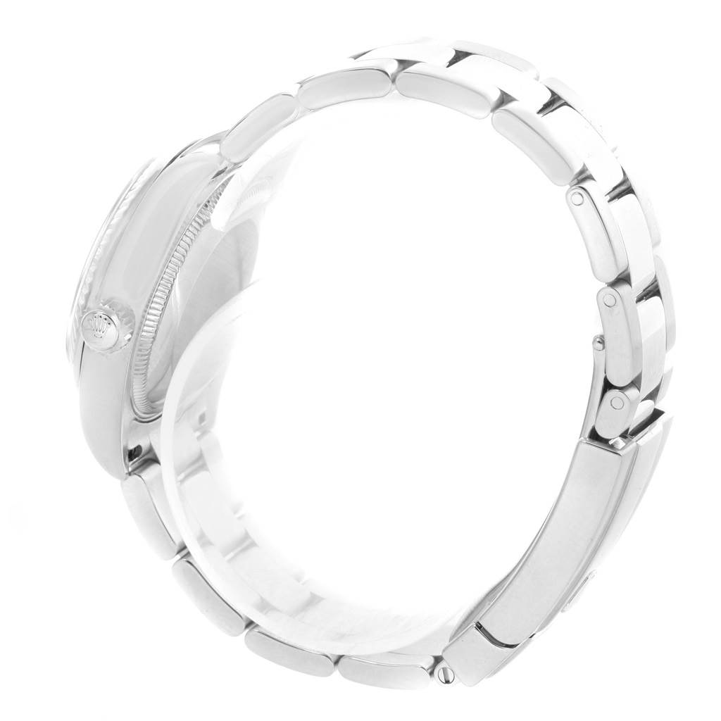 The image shows a side view of a Mid-Size Rolex watch, highlighting the case, crown, and bracelet.