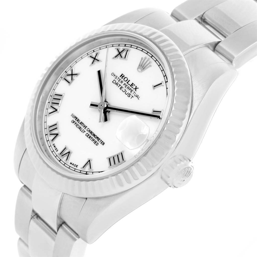 The image shows a side angle of a Rolex Mid-Size 178274 Women's Stainless Steel White Dial 178274 Women's Stainless Steel White Dial Datejust watch, displaying its white dial, Roman numerals, fluted bezel, and a portion of the bracelet.