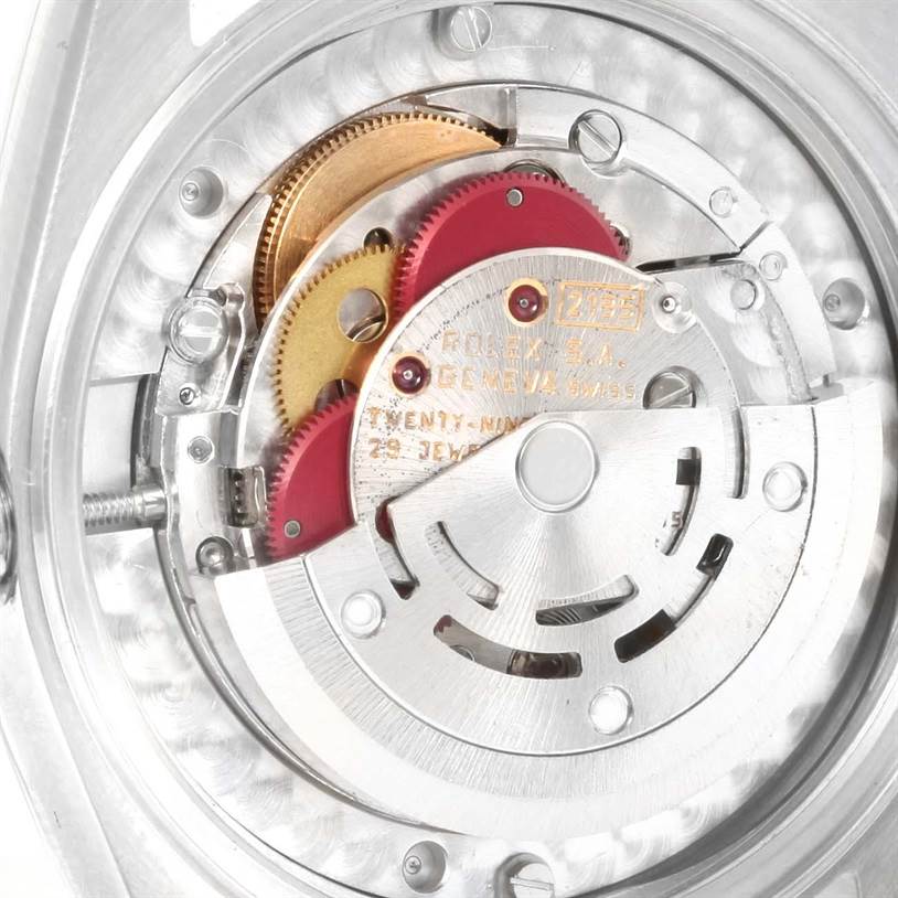 This image shows the inner mechanism and movement of a Rolex Mid-Size 68240 Women's Stainless Steel Silver Dial 68240 Women's Stainless Steel Silver Dial watch.