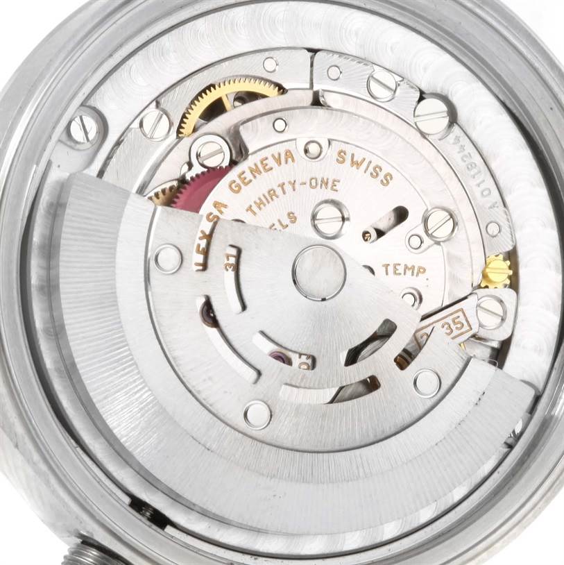 The image shows the internal mechanism and movement of a Rolex Mid-Size 78240 Women's Stainless Steel Pink Dial 78240 Women's Stainless Steel Pink Dial model watch viewed from the back.