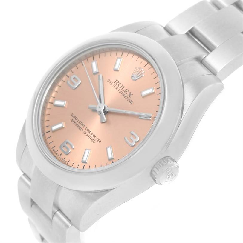 This image shows a Mid-Size Rolex Oyster Perpetual watch from a three-quarter angle, highlighting the face, bezel, and bracelet.