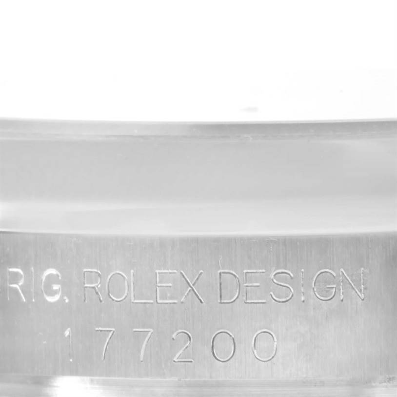 This close-up shows the engraving on the side of the case for a Rolex Mid-Size 177200 Women's Stainless Steel Pink Dial 177200 Women's Stainless Steel Pink Dial model 177200.