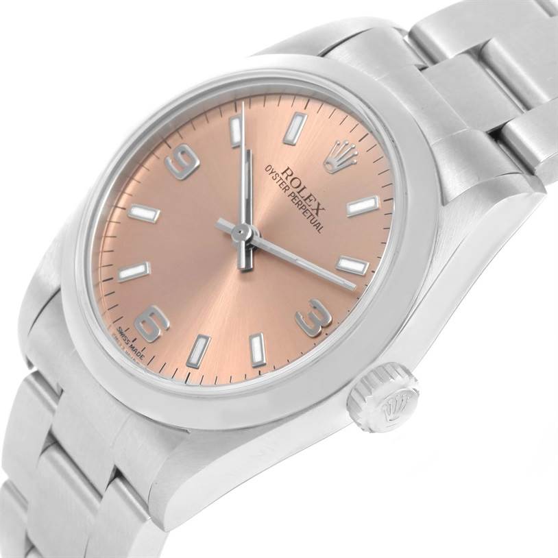 The image shows the Rolex Mid-Size 77080 Women's Stainless Steel Pink Dial 77080 Women's Stainless Steel Pink Dial Oyster Perpetual watch at an oblique angle, displaying the face, bracelet, and crown.