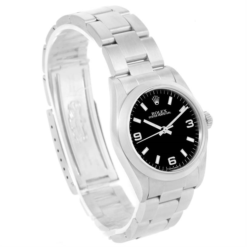 The image shows a side angle of the Rolex Mid-Size 67480 Women's Stainless Steel Black Dial 67480 Women's Stainless Steel Black Dial Oyster Perpetual watch, featuring its face and stainless steel bracelet.