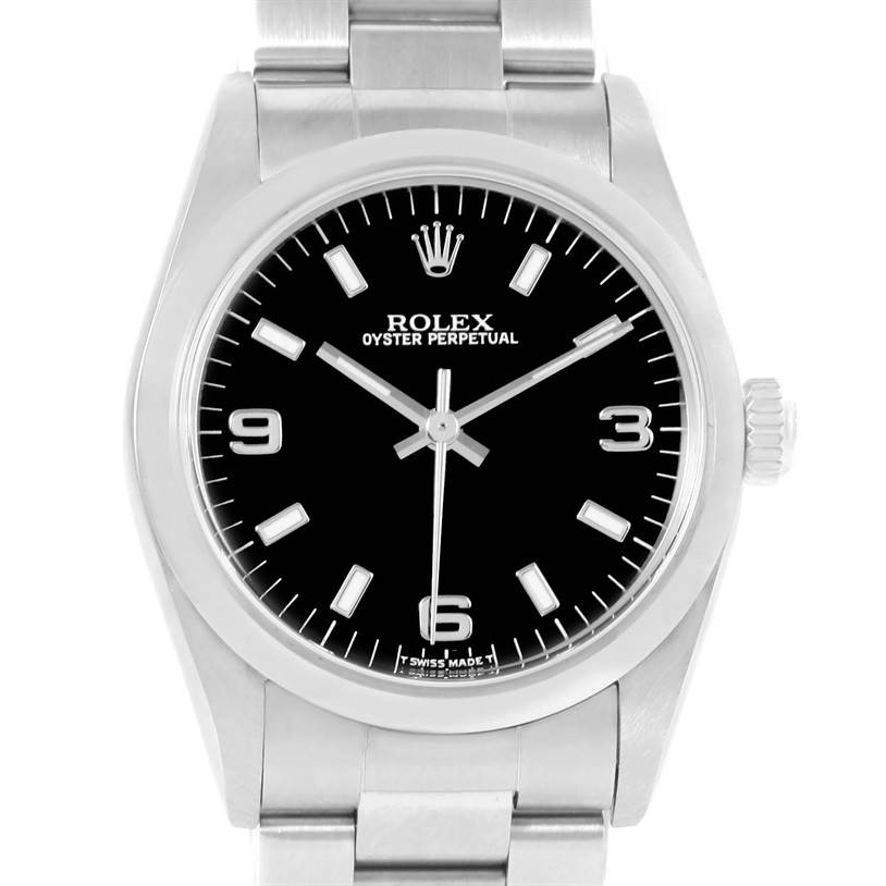 The image shows a front view of a Rolex Mid-Size 67480 Women's Stainless Steel Black Dial 67480 Women's Stainless Steel Black Dial Oyster Perpetual watch, showcasing its dial, bezel, crown, and bracelet.