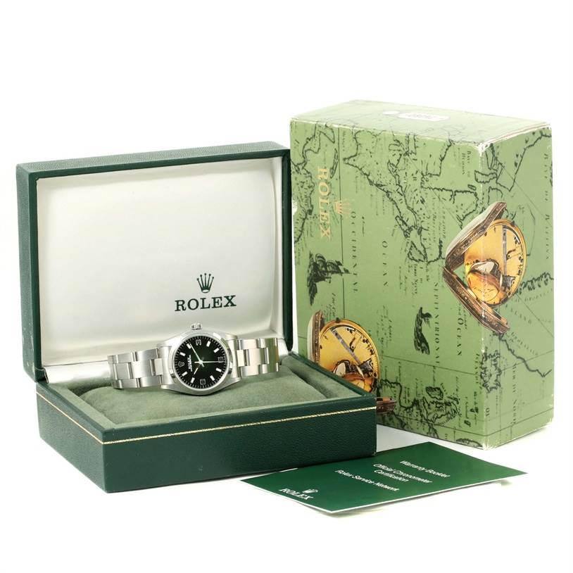 The image shows a Rolex Mid-Size 67480 Women's Stainless Steel Black Dial 67480 Women's Stainless Steel Black Dial model watch, with its box and certificates, viewed from the front angle.