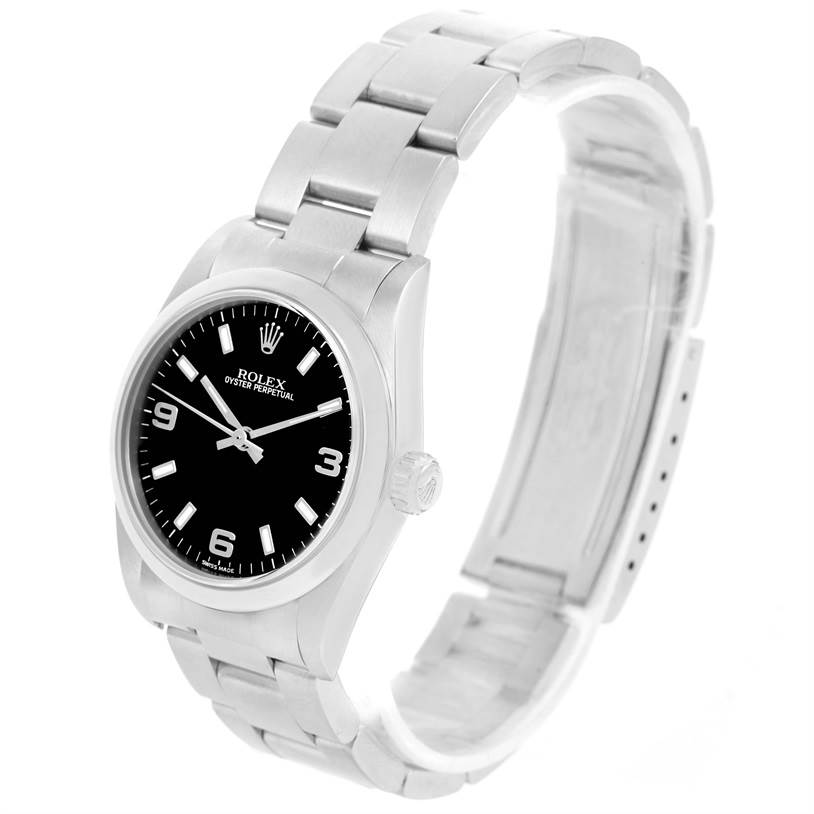 The image shows a Rolex Mid-Size 77080 Women's Stainless Steel Black Dial 77080 Women's Stainless Steel Black Dial Oyster Perpetual watch at a slight angle showcasing the dial, bracelet, and crown.