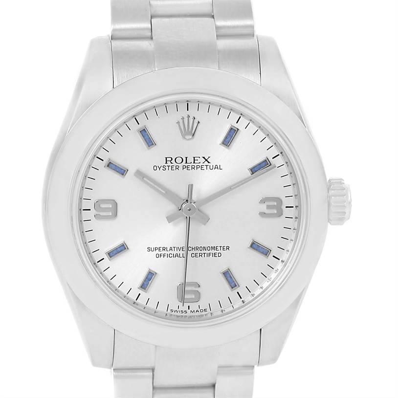 The image is a front view of a Rolex Oyster Perpetual Mid-Size watch showing the dial, bezel, and part of the bracelet.