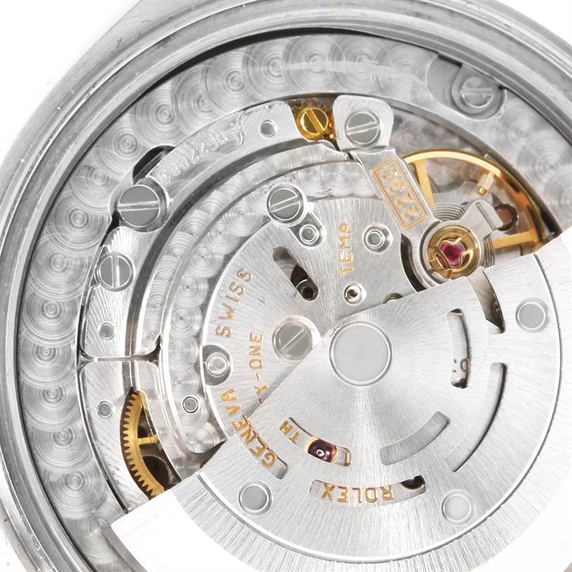 This image shows the internal mechanical parts of a Rolex Mid-Size 77080 Women's Stainless Steel Pink Dial 77080 Women's Stainless Steel Pink Dial watch from a top view angle.