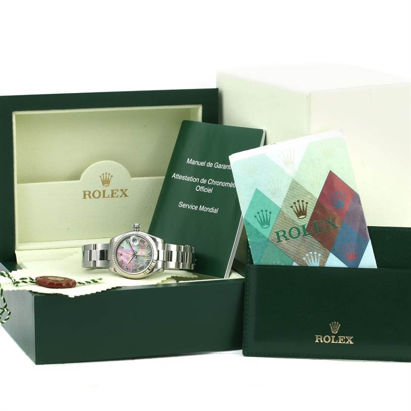 The Rolex Mid-Size 178274 Women's Stainless Steel Mother of Pearl Dial 178274 Women's Stainless Steel Mother of Pearl Dial model is shown from the front in its box, alongside manuals and certification documents.