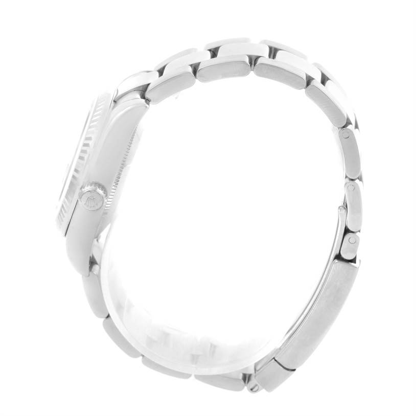 The image shows a side view of the Rolex Mid-Size 178274 Women's Stainless Steel Mother of Pearl Dial 178274 Women's Stainless Steel Mother of Pearl Dial model, highlighting its bracelet and crown.