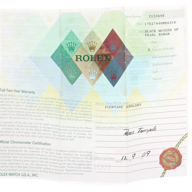 This image shows the warranty card for a Mid-Size Rolex watch, displaying its serial number, purchase details, and specifications.