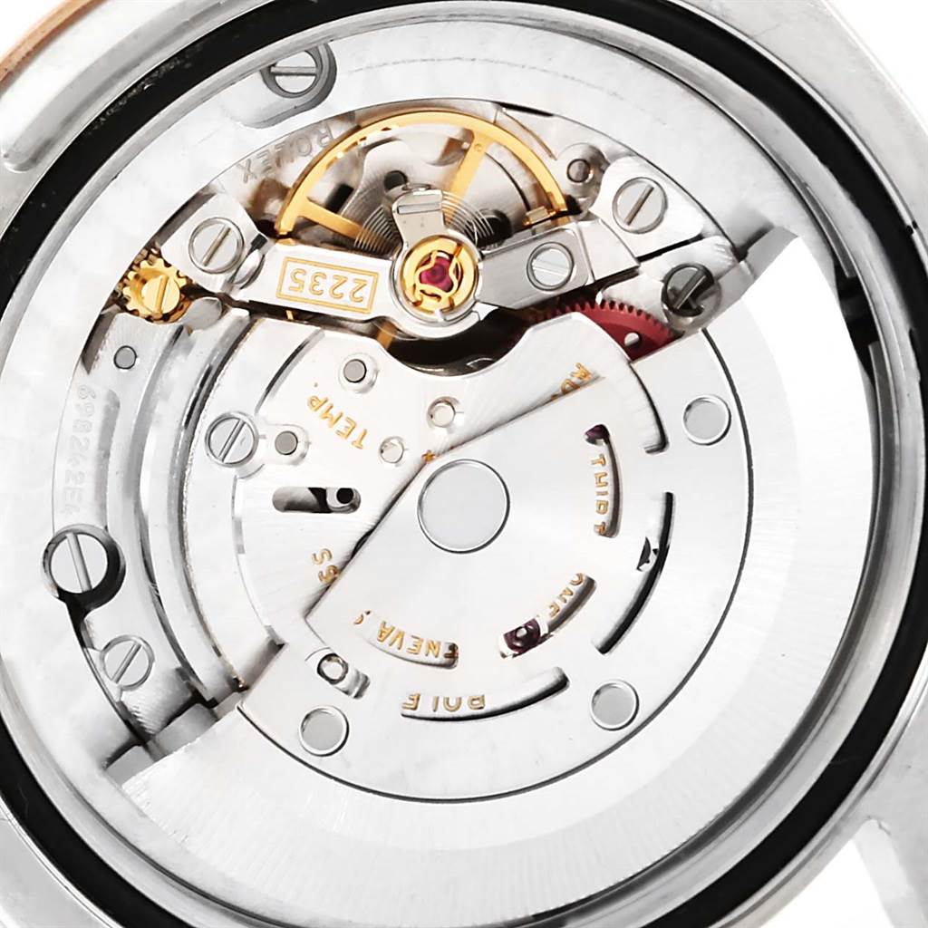 This image shows an internal close-up of the movement mechanism of a Rolex Mid-Size 178271 Women's Steel and Gold (two tone) Pink Dial 178271 Women's Steel and Gold (two tone) Pink Dial model watch.