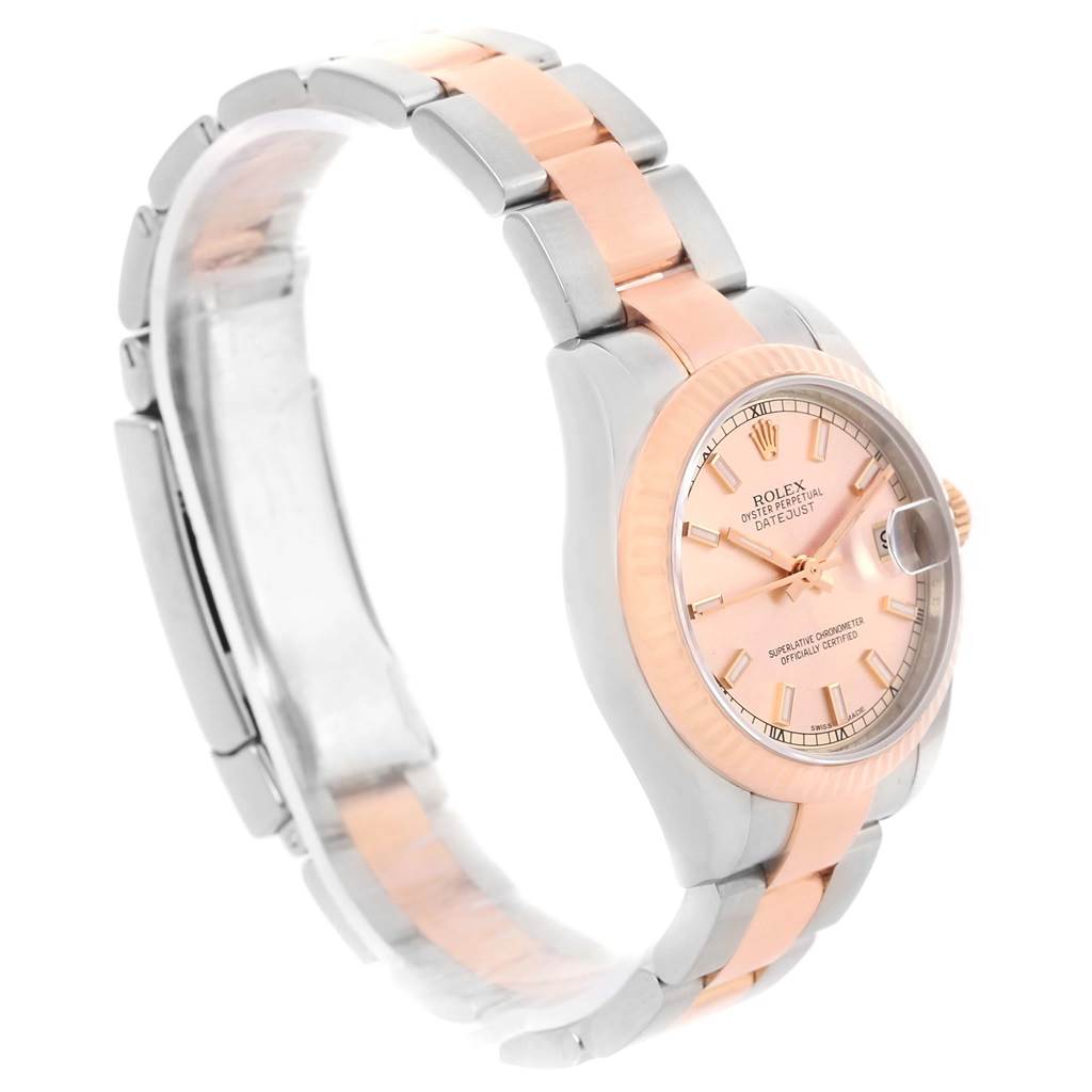 The image shows a side angle of a Rolex Mid-Size 178271 Women's Steel and Gold (two tone) Pink Dial 178271 Women's Steel and Gold (two tone) Pink Dial Datejust watch, highlighting its bezel, dial, crown, and a two-tone bracelet.