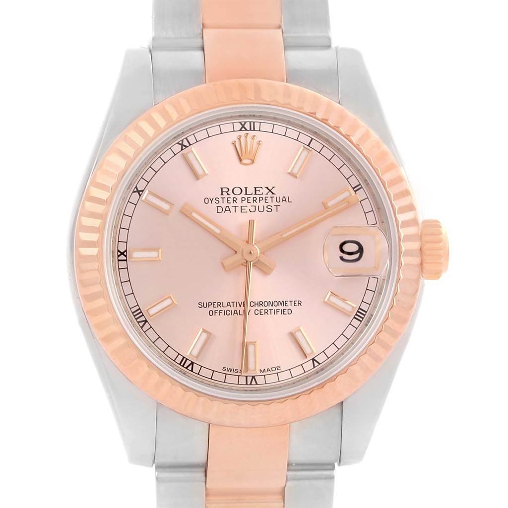The image shows a frontal view of the Rolex Mid-Size 178271 Women's Steel and Gold (two tone) Pink Dial 178271 Women's Steel and Gold (two tone) Pink Dial Datejust watch, highlighting its pink dial, fluted bezel, and two-tone bracelet.
