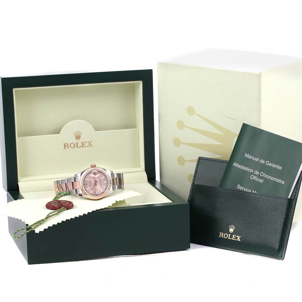 The image shows a Mid-Size Rolex watch presented in an open box with warranty papers and accessories.