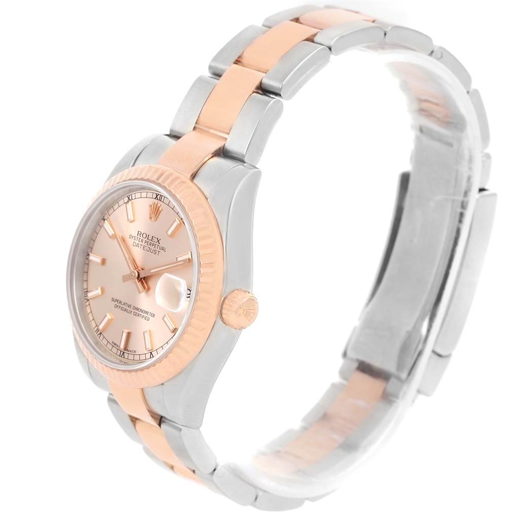 This image shows a side angle of the Rolex Mid-Size 178271 Women's Steel and Gold (two tone) Pink Dial 178271 Women's Steel and Gold (two tone) Pink Dial watch, highlighting its two-tone bracelet and face.