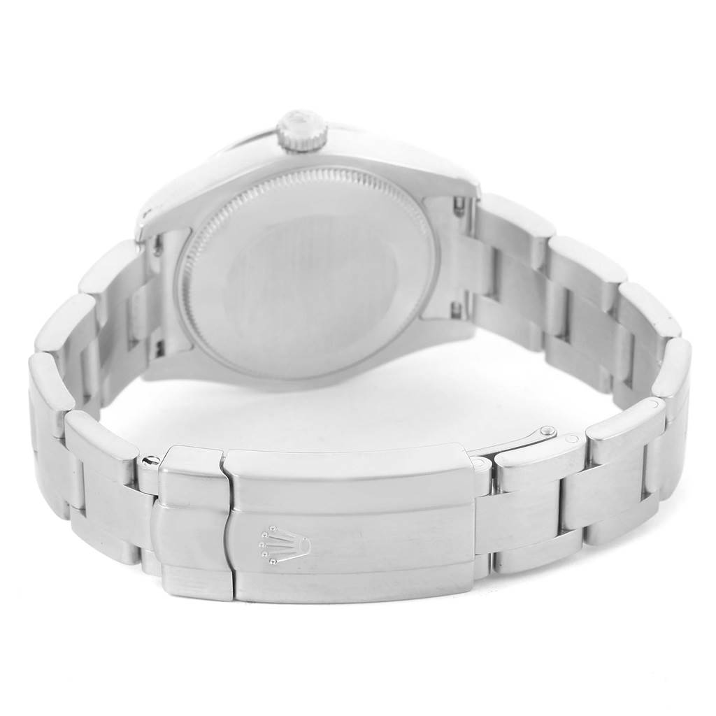 The image shows the back view of a Mid-Size Rolex watch, including the clasp and bracelet.