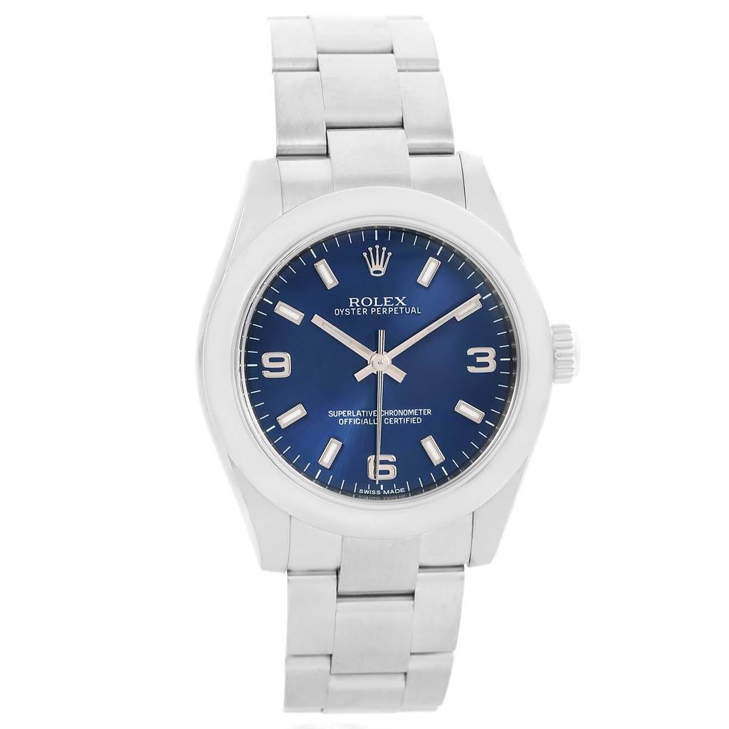 This Rolex Oyster Perpetual Mid-Size watch is shown from the front, displaying its blue dial, hour markers, hands, and silver bracelet.