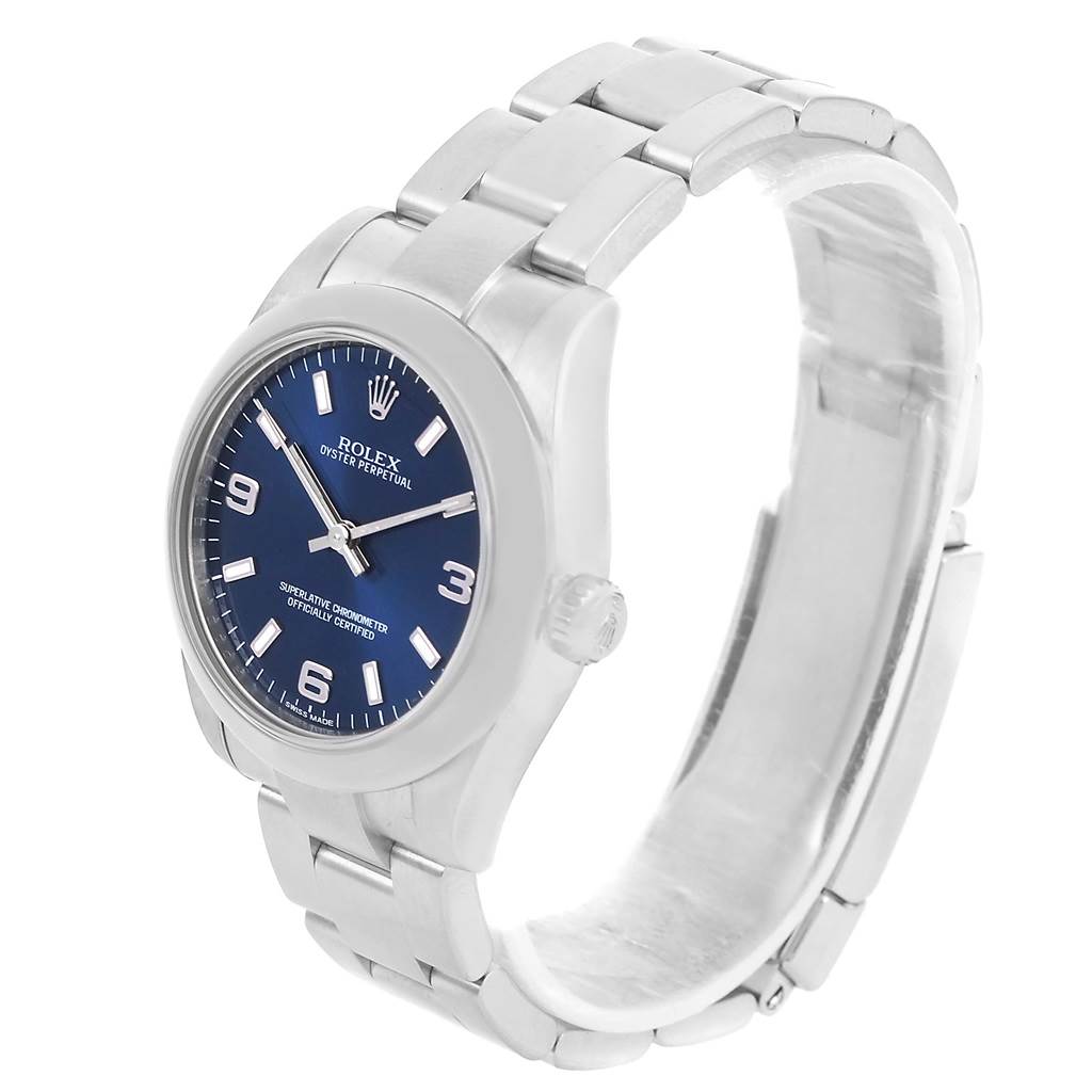 The image shows a Rolex Oyster Perpetual Mid-Size model at a slight angle, highlighting the face, bezel, and a portion of the bracelet.