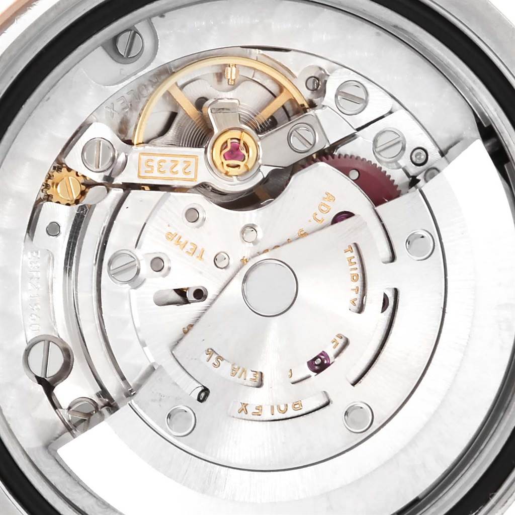 This image shows the internal movement mechanism of a Rolex Mid-Size 178241 Women's Steel and Gold (two tone) Pink Dial 178241 Women's Steel and Gold (two tone) Pink Dial model watch viewed from the back.