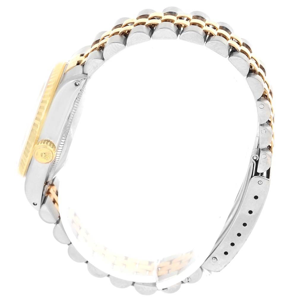 This image shows a side view of a Rolex Mid-Size 68273 Women's Steel and Gold (two tone) Beige Dial 68273 Women's Steel and Gold (two tone) Beige Dial watch, focusing on the crown and jubilee bracelet.