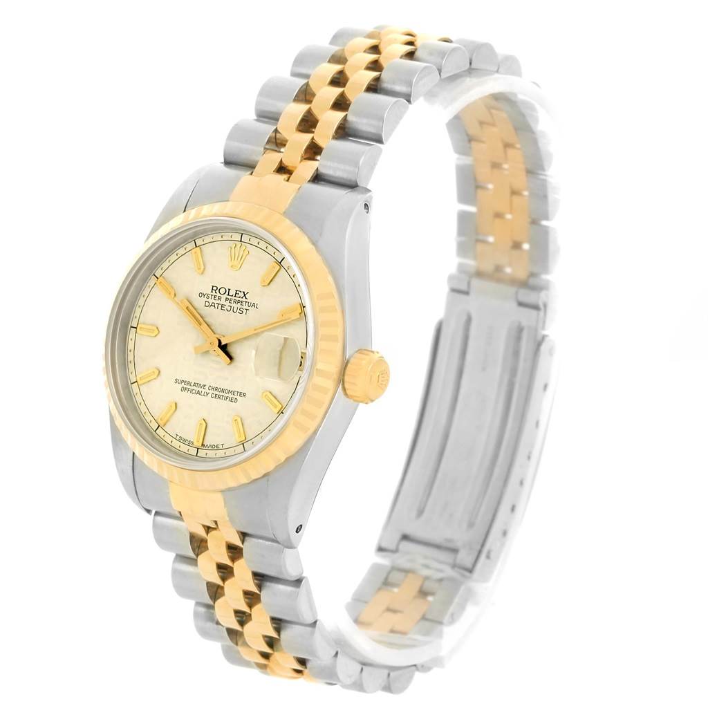 The image shows the Rolex Mid-Size 68273 Women's Steel and Gold (two tone) Beige Dial 68273 Women's Steel and Gold (two tone) Beige Dial Oyster Perpetual Datejust watch at a slight angle, highlighting its face, bezel, and two-tone bracelet.