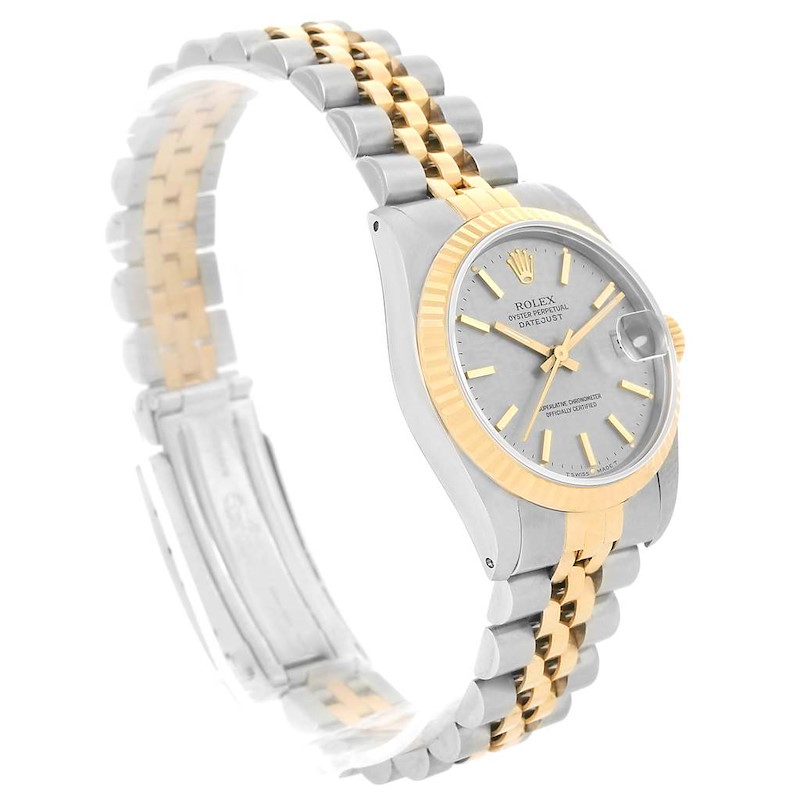 The image shows a side angle of a Rolex Mid-Size model watch, highlighting its silver and gold Jubilee bracelet and bezel.