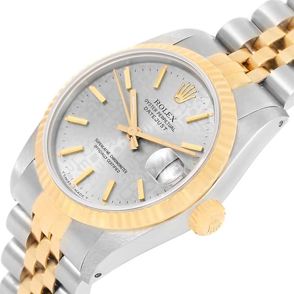 The image shows a Rolex Mid-Size 68273 Women's Steel and Gold (two tone) Silver Dial 68273 Women's Steel and Gold (two tone) Silver Dial Datejust watch, angled slightly from above, highlighting the dial, bezel, and part of the bracelet.
