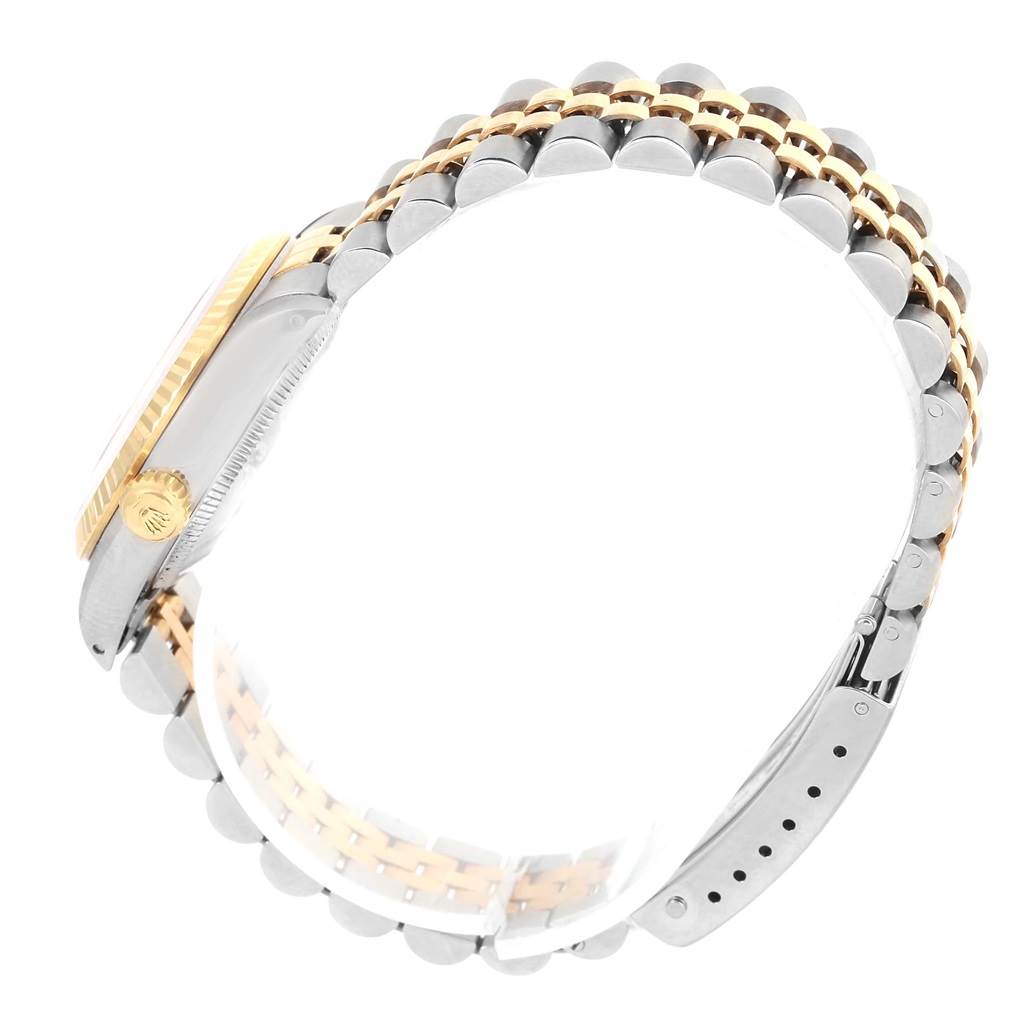 This image shows a side view of the case and bracelet of a Rolex Mid-Size 68273 Women's Steel and Gold (two tone) Silver Dial 68273 Women's Steel and Gold (two tone) Silver Dial model watch, highlighting the two-tone metal.