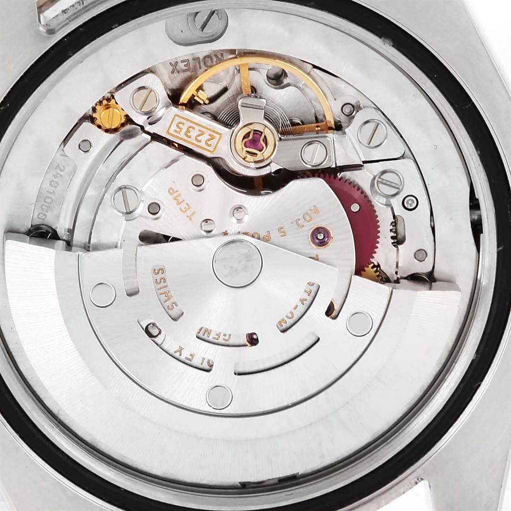 The image shows the internal mechanism or movement of the Mid-Size Rolex watch, viewed from the back.