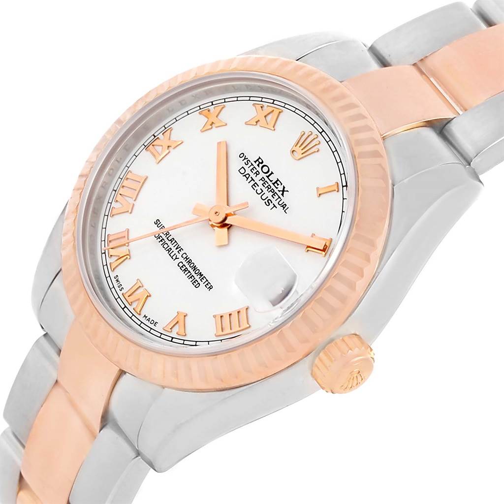 The image shows a mid-size Rolex watch from an angled top view, highlighting the face, bezel, and part of the bracelet.