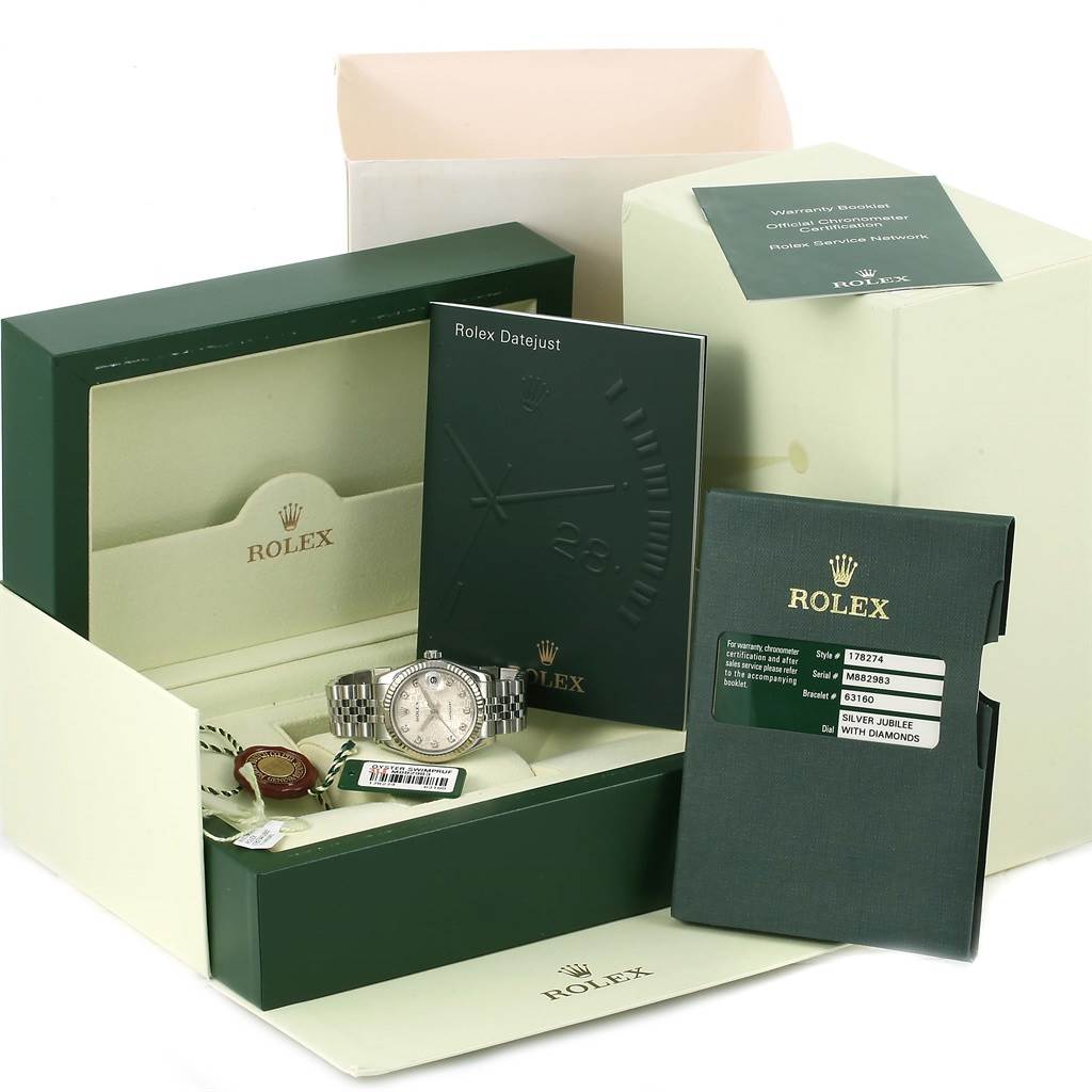 The image shows a Rolex Mid-Size 178274 Women's Stainless Steel Silver Dial 178274 Women's Stainless Steel Silver Dial model watch with its box, manuals, tags, and warranty card, viewed from the front.