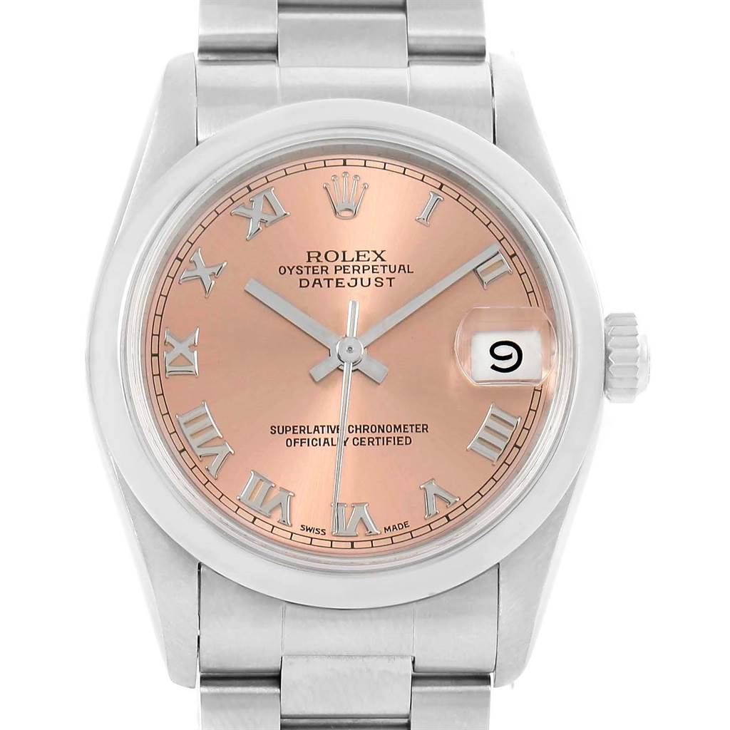 This Rolex Mid-Size 68240 Women's Stainless Steel Pink Dial 68240 Women's Stainless Steel Pink Dial Oyster Perpetual Datejust watch is shown from the front, displaying a pink dial, Roman numerals, and a date window at 3 o'clock.