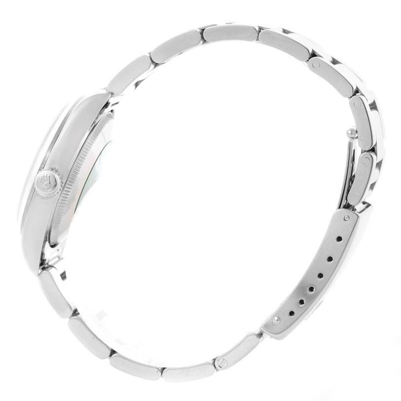 Side view of a Mid-Size Rolex watch showcasing the case, crown, and bracelet.