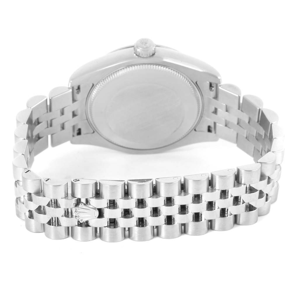 The image shows the back case and bracelet of a Mid-Size Rolex watch from a rear angle.