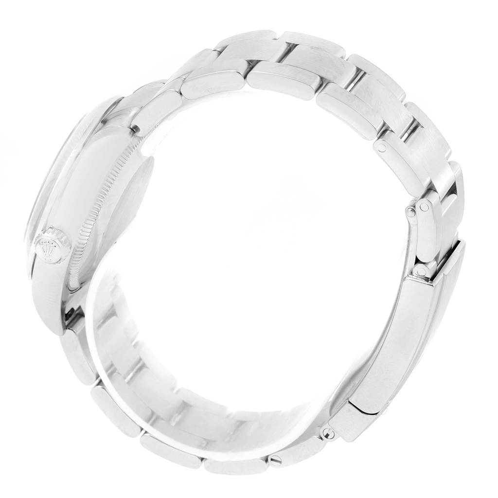 The image shows a side view of a Mid-Size Rolex watch, focusing on the bracelet and clasp.