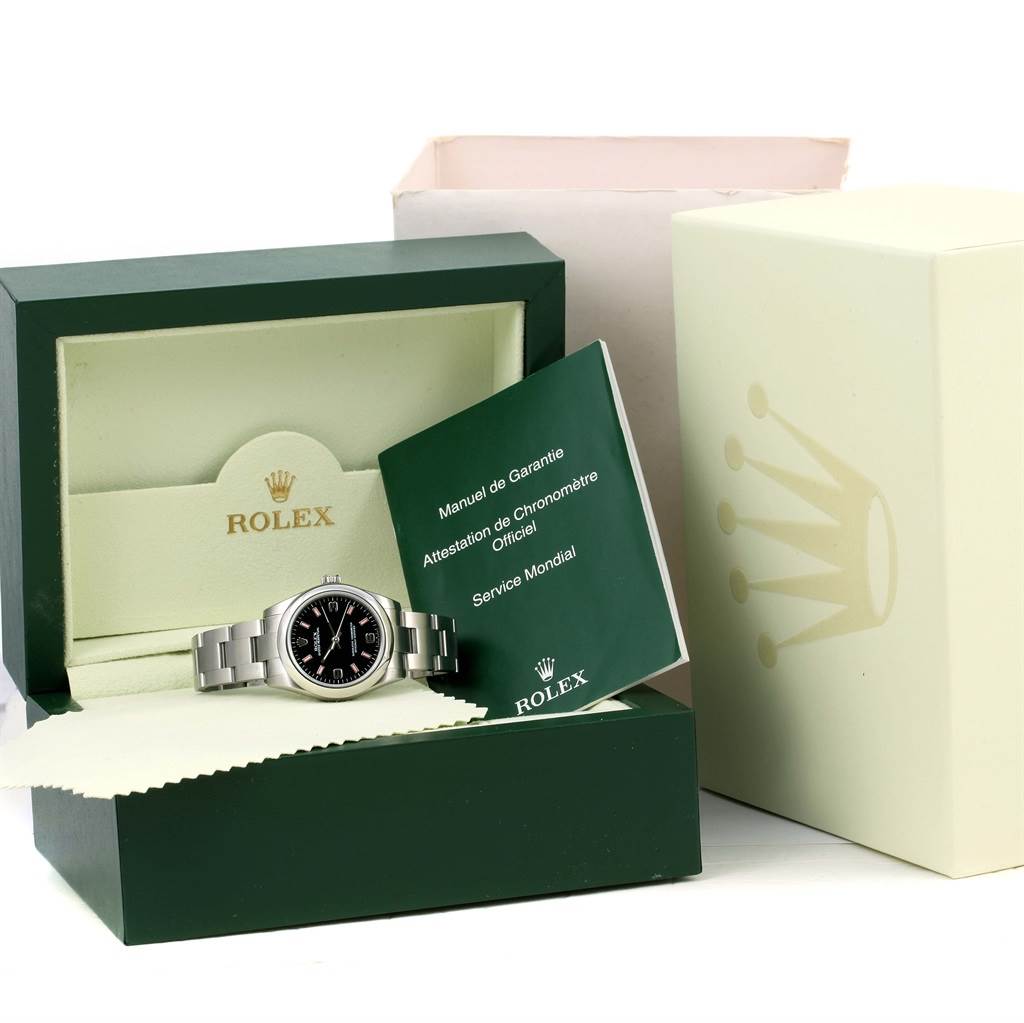 The image shows a Rolex Mid-Size 177200 Women's Stainless Steel Black Dial 177200 Women's Stainless Steel Black Dial model watch in its box, with manuals and official documents.