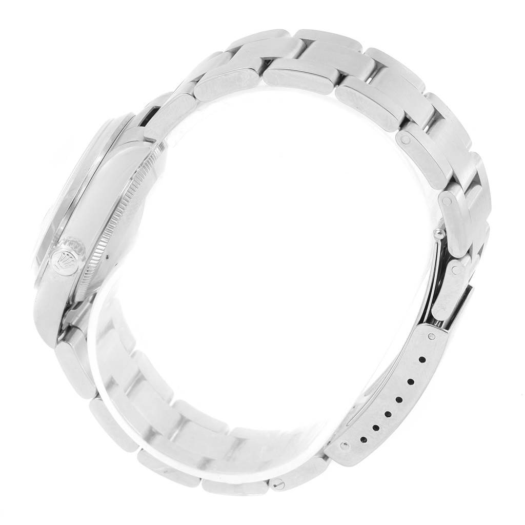 The image shows a Rolex Mid-Size 78240 Women's Stainless Steel Black Dial 78240 Women's Stainless Steel Black Dial model watch from the side, highlighting the bracelet and a portion of the case.