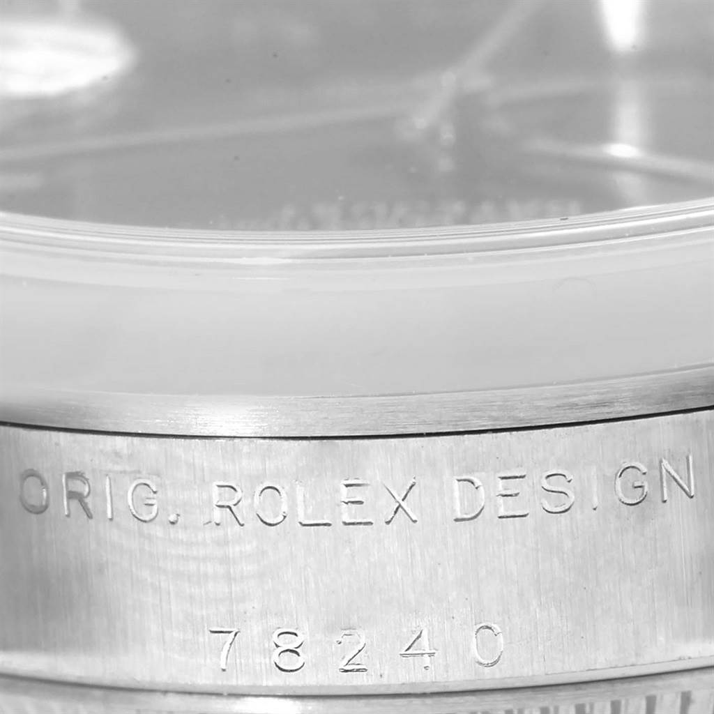This image shows a close-up of the case side, bezel, and crystal of a Mid-Size Rolex watch, highlighting the engraved text "ORIG. ROLEX DESIGN 78240."