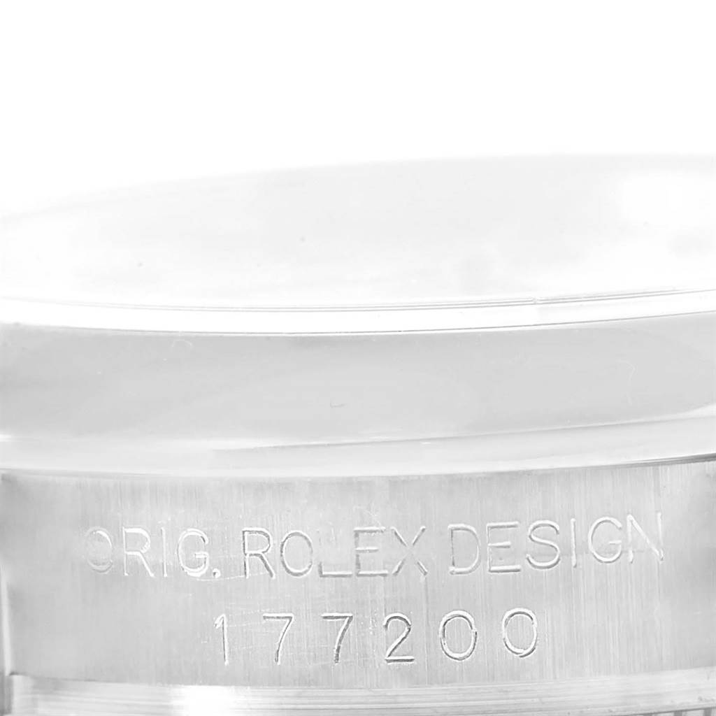 This image shows the side of a Mid-Size Rolex watch case with engraved text including "ORIG. ROLEX DESIGN" and "177200."