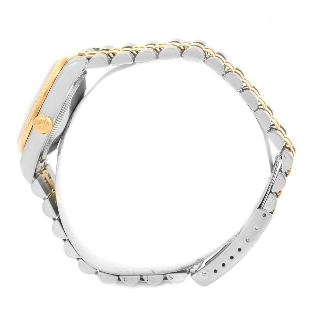 This image shows the side profile of a Mid-Size Rolex watch, highlighting the case, crown, and bracelet.