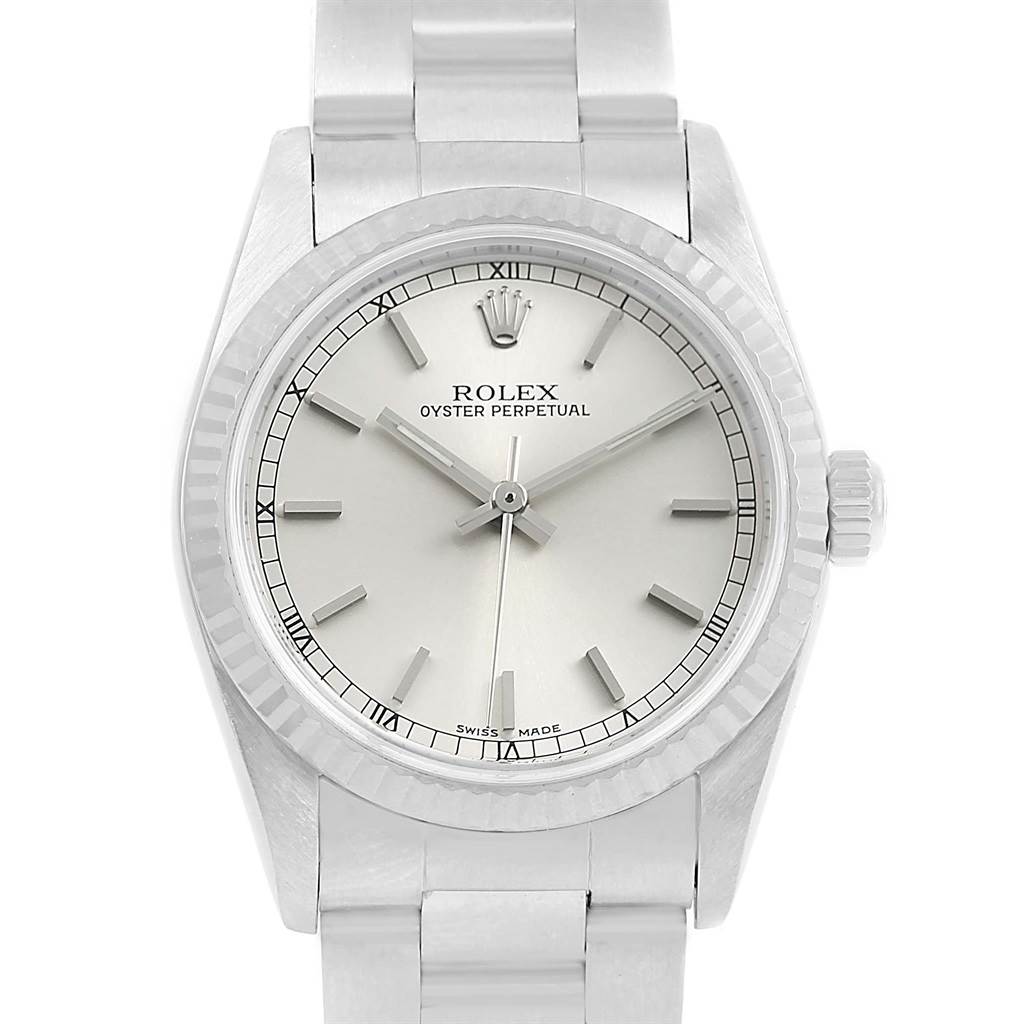 This is a frontal view of the Rolex Oyster Perpetual Mid-Size watch showing the face, bezel, crown, and part of the bracelet.