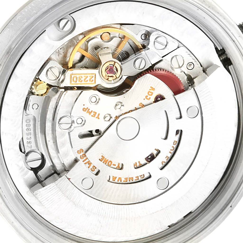 This is a close-up view of the movement and internal mechanism of a mid-size Rolex watch.