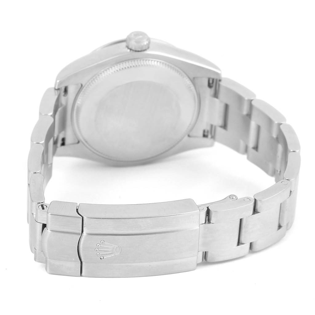 The image shows the back view of a Mid-Size Rolex watch, highlighting the case back and the bracelet with its clasp.