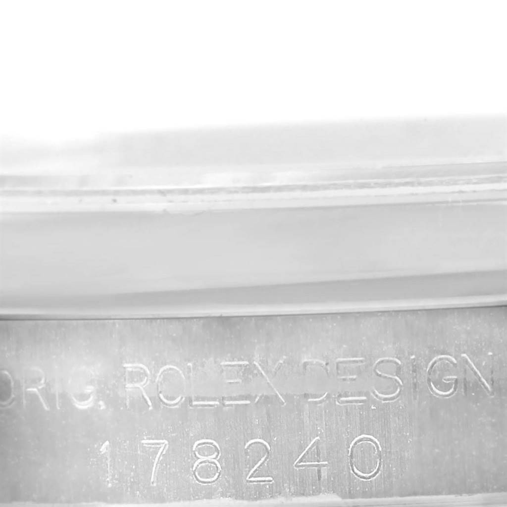 The image shows a close-up of the case side of a Rolex Mid-Size 178240 Women's Stainless Steel Grey Dial 178240 Women's Stainless Steel Grey Dial model, featuring its engraved reference number 178240.