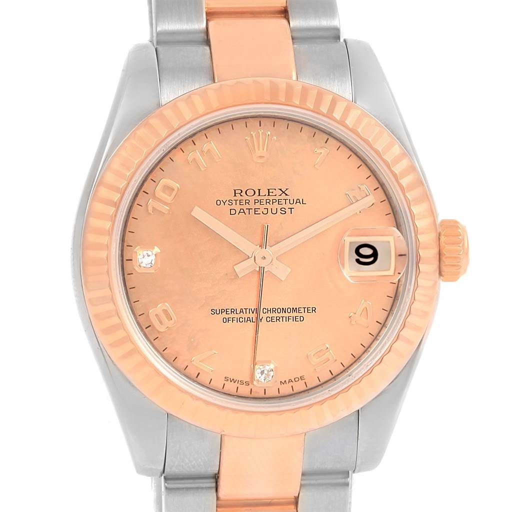 The image shows a frontal view of a Rolex Mid-Size 178271 Women's Steel and Gold (two tone) Pink Dial 178271 Women's Steel and Gold (two tone) Pink Dial Datejust watch, highlighting the dial, hands, bezel, crown, and part of the bracelet.