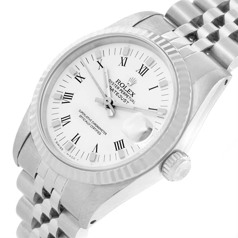 This image shows a close-up angle of a Rolex Mid-Size 68274 Women's Stainless Steel White Dial 68274 Women's Stainless Steel White Dial Datejust watch, displaying the face, crown, and part of the bracelet.