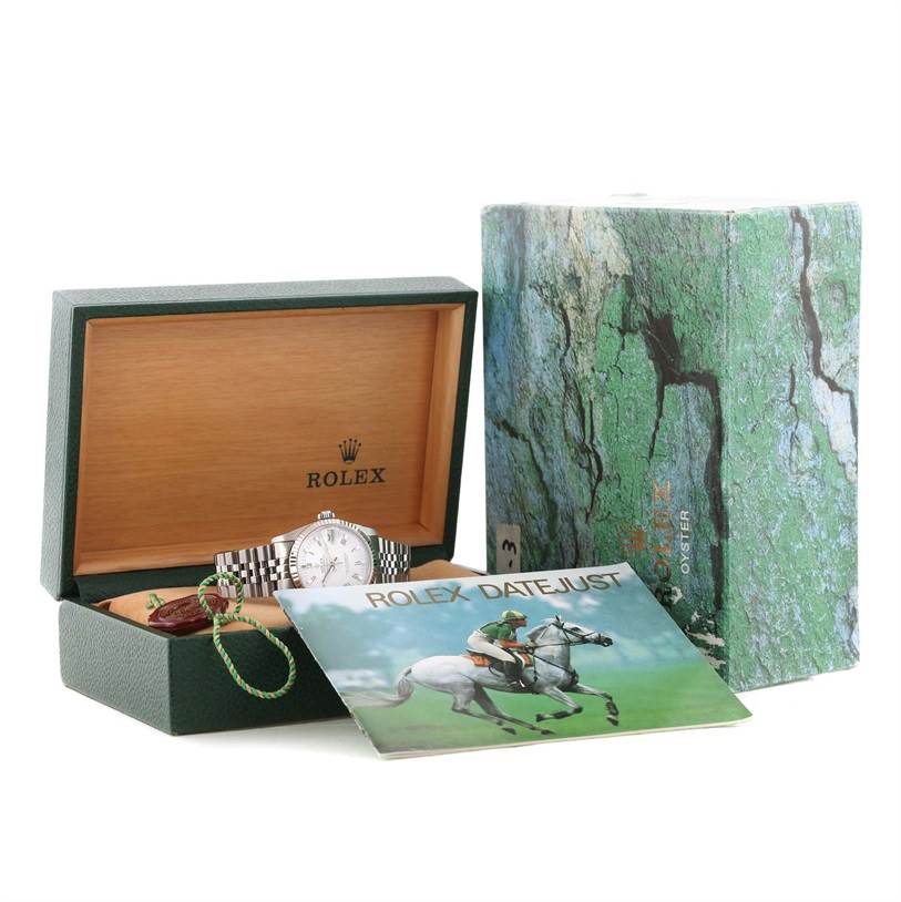 The image shows a Rolex Mid-Size 68274 Women's Stainless Steel White Dial 68274 Women's Stainless Steel White Dial model watch in its open box along with its outer box and a brochure.