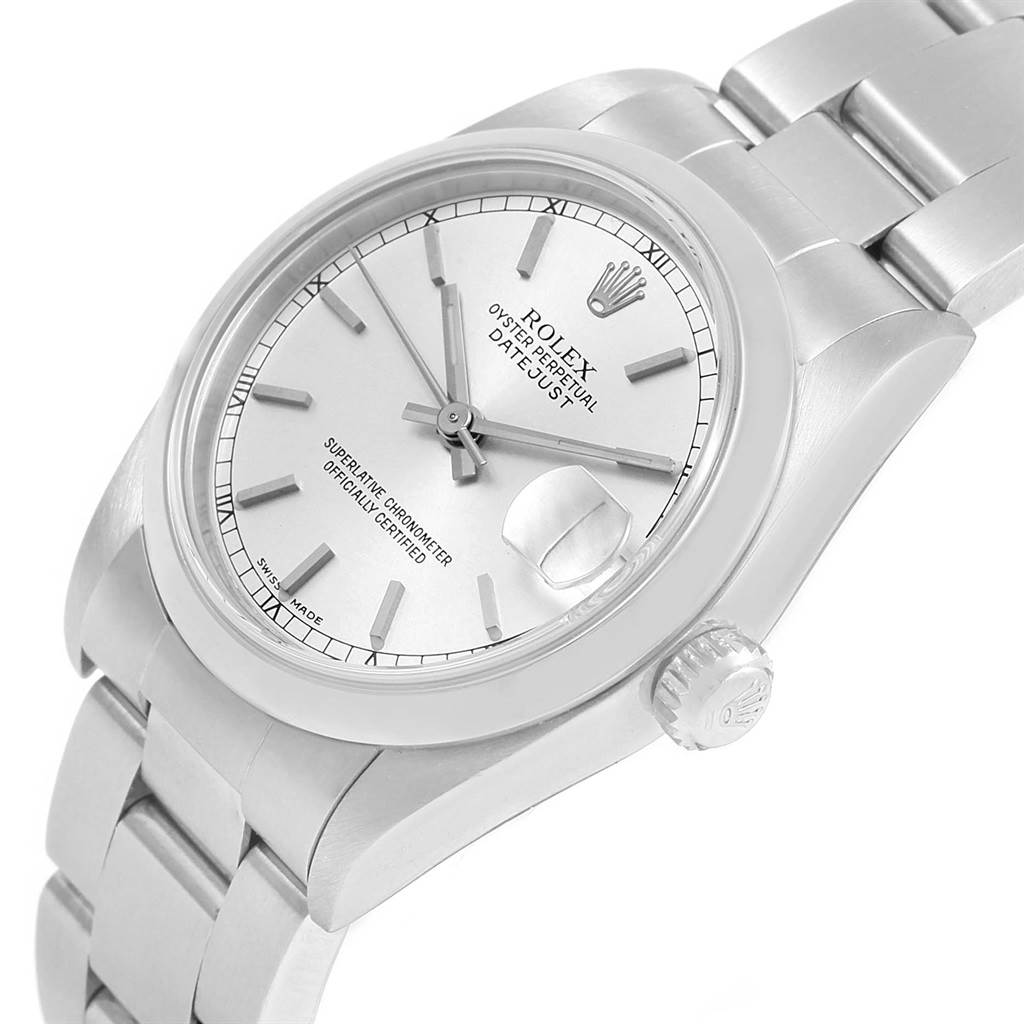 This image shows a Mid-Size Rolex Datejust watch from an angle highlighting the face, bezel, crown, and part of the bracelet.